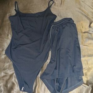 Blue 2 piece set. Body suit and shorts combo!